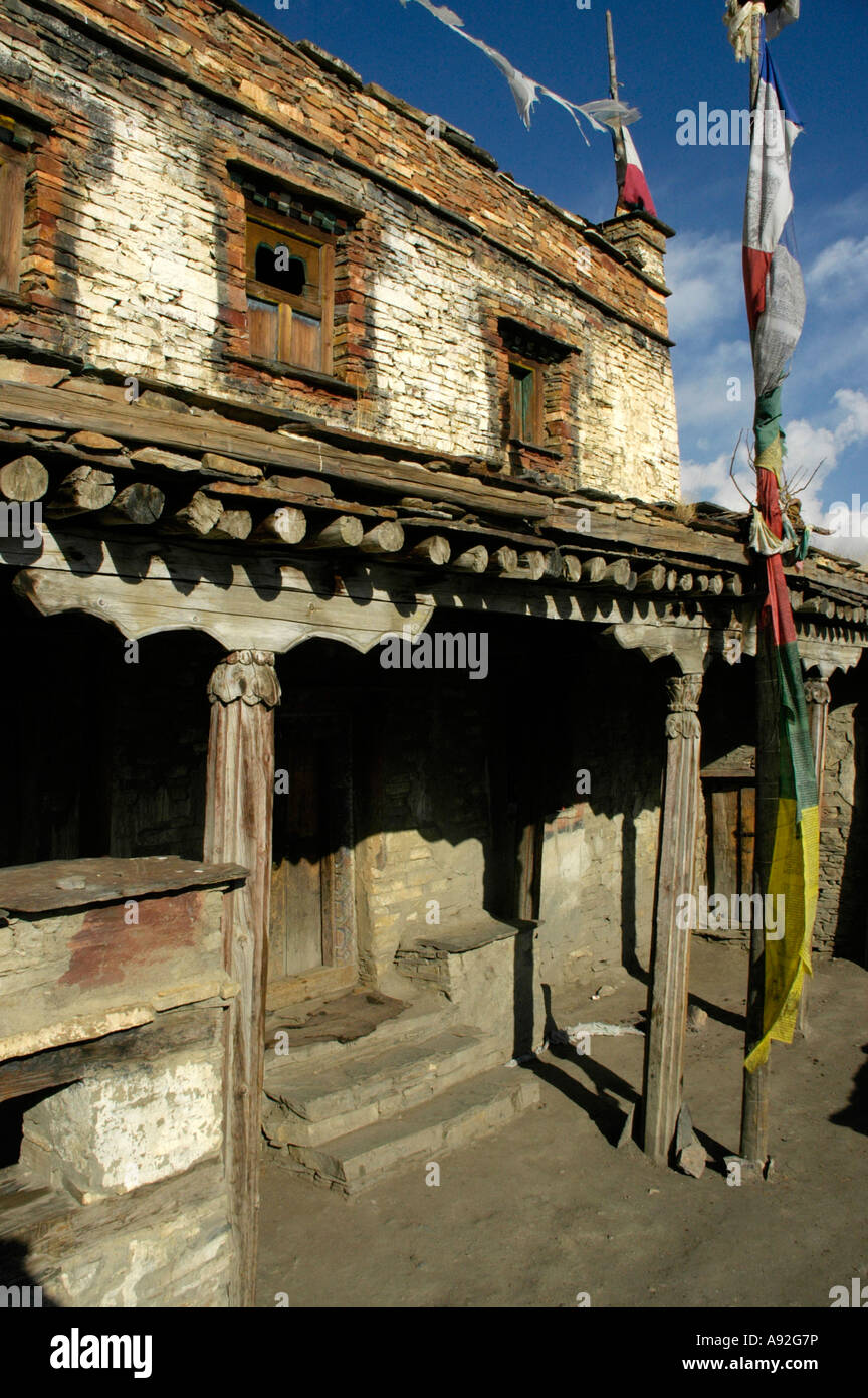 Entrance of a rustic monastery Gompa with abutments made of wood Nar Nar-Phu Annapurna Region Nepal Stock Photo