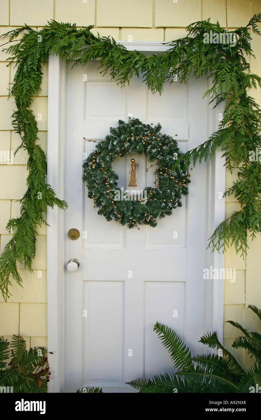 Wreath hanging on a door Stock Photo Alamy