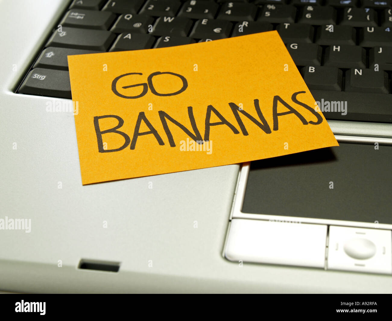 memo note on notebook, go bananas Stock Photo