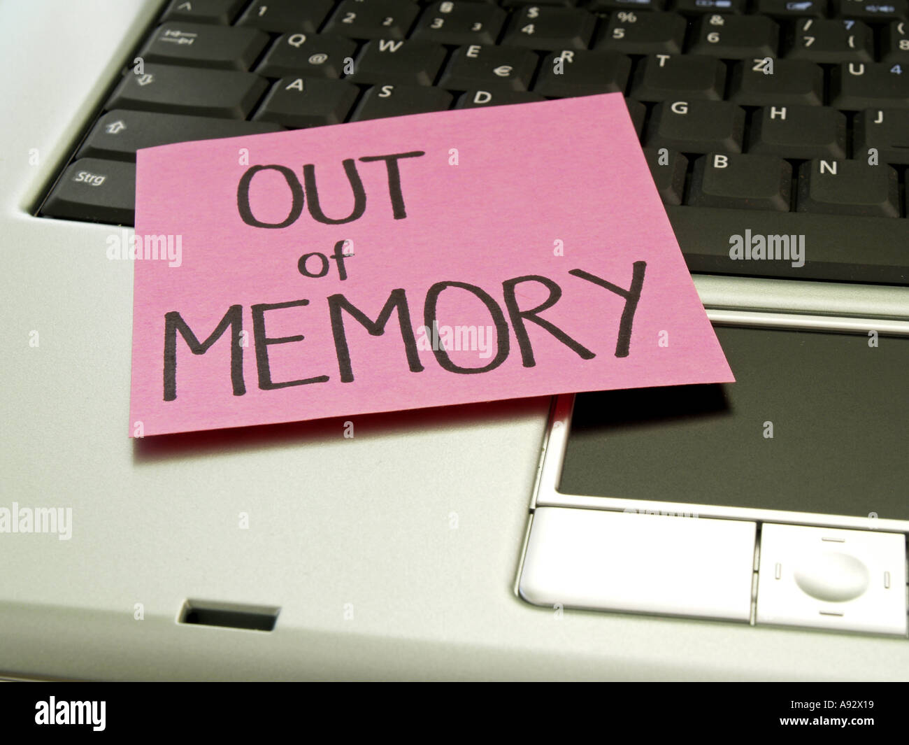 memo note on notebook out of memory Stock Photo