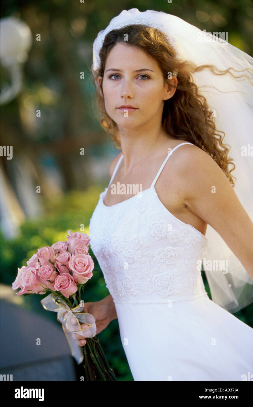 Woman posing in a dress hi-res stock photography and images - Alamy