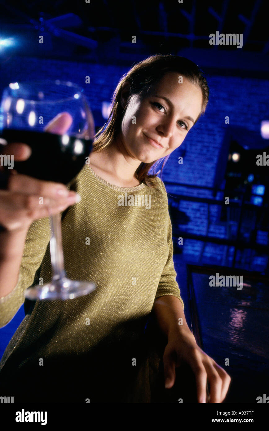 Woman glass wine red offering hi-res stock photography and images - Alamy