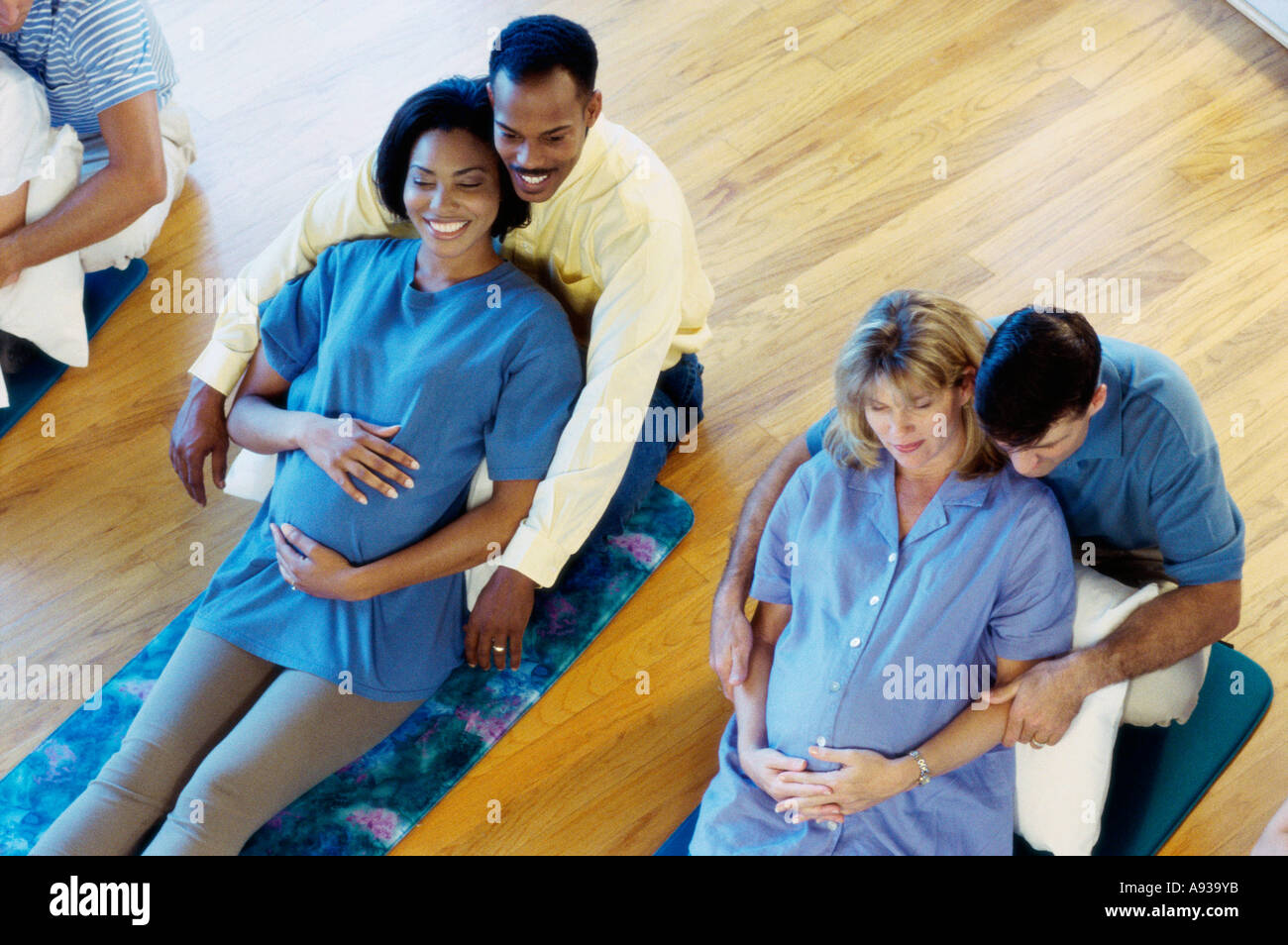 High angle view of pregnant wives with their husbands in a prenatal class  Stock Photo - Alamy
