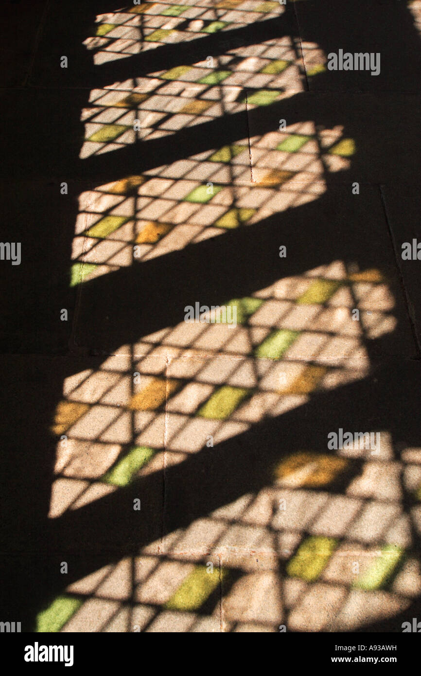 Wells Cathedral stained glass reflection on sunny day in cloister area Somerset Stock Photo Alamy