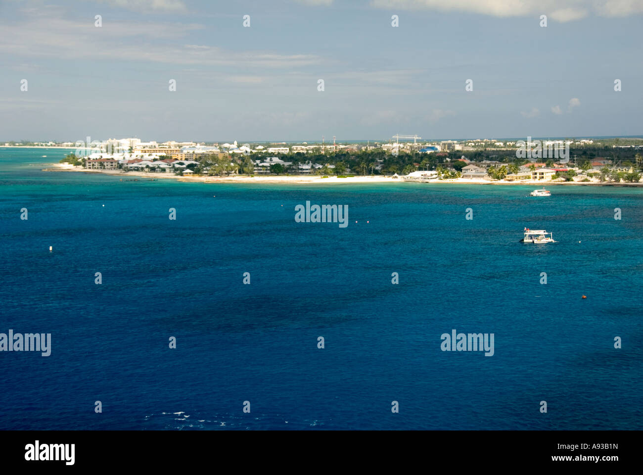 aerial George Town Grand Cayman  condos beach caribbean green water scenic landscape shoreline tour boats shoreline Stock Photo