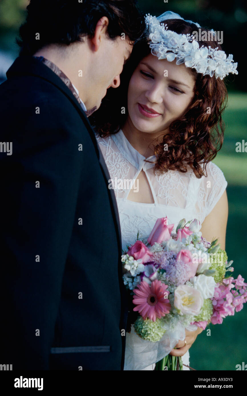 Close-up of a newlywed couple talking to each other Stock Photo