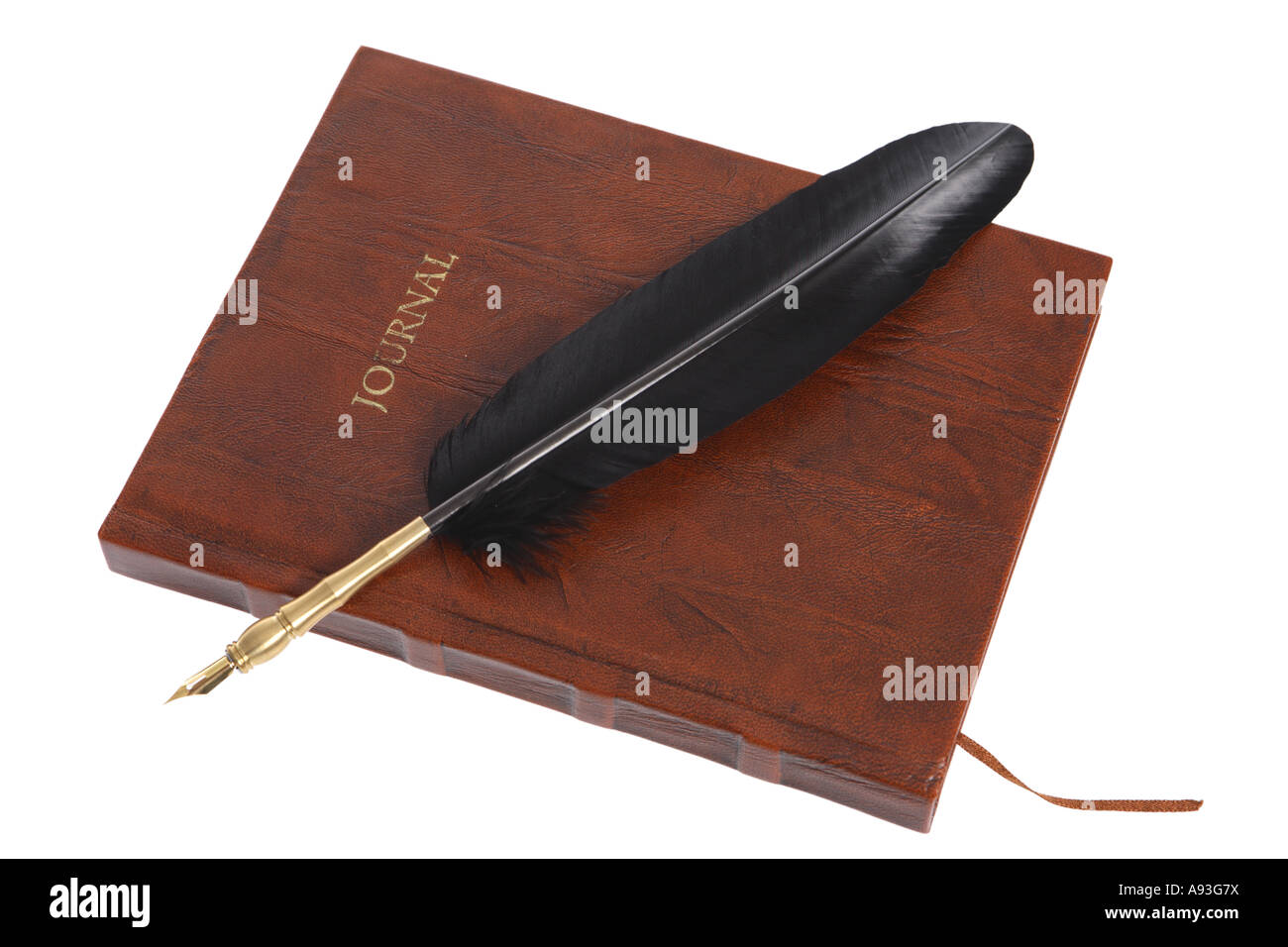 Quill Pen and a Leather Journal cut out on white background Stock Photo