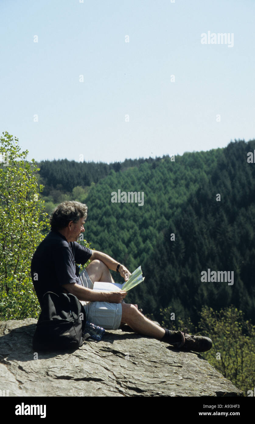 Walker in the Belgian Ardennes overlooking the Semois river Belgium Stock Photo