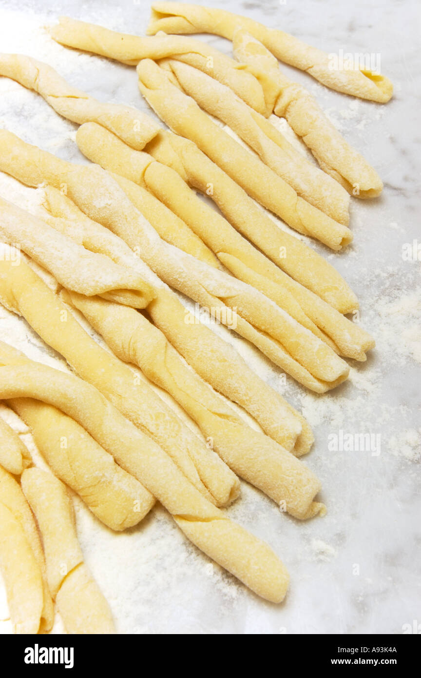hand made Maccheroni siciliana PASTA speciality special on a white marble plate Stock Photo
