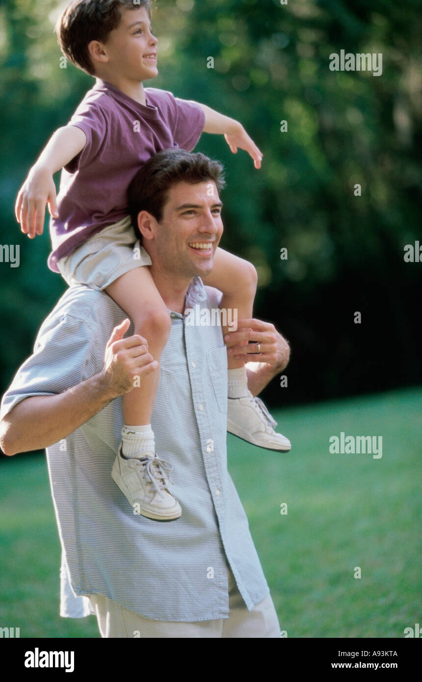 Close-up of a father carrying his son on his shoulders Stock Photo - Alamy