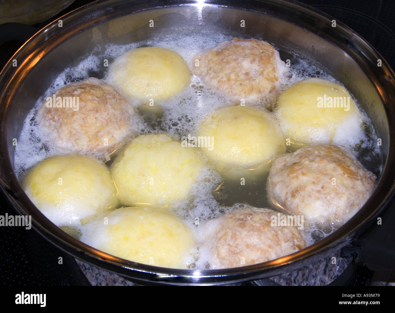 cooking the dumplings in hot water pot bavaria  eat Stock Photo