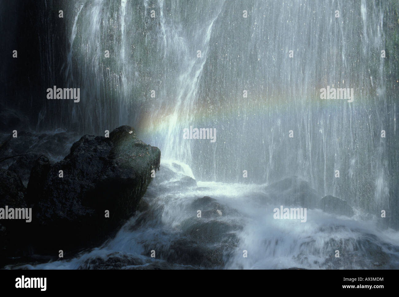 waterfall with rainbow in the Wasserloch gorge Stock Photo