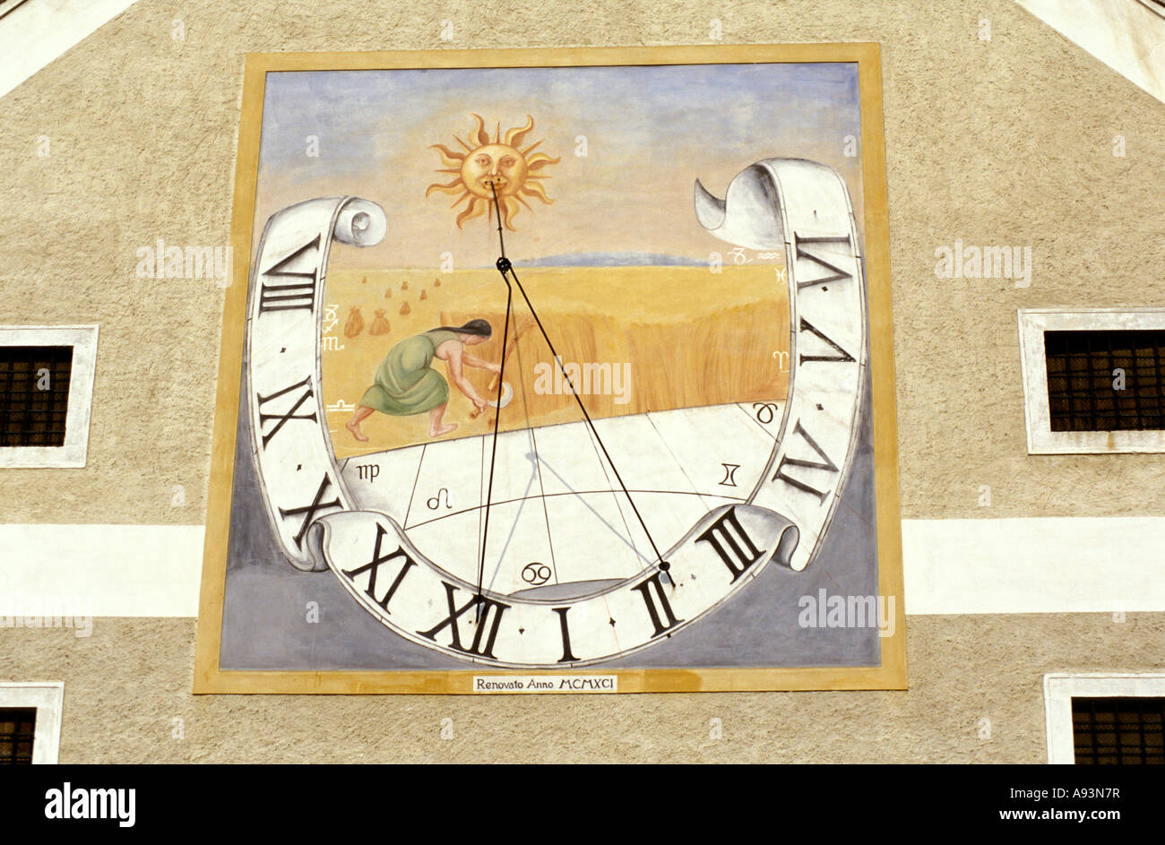 sun clock at the pouring box in Essling Stock Photo