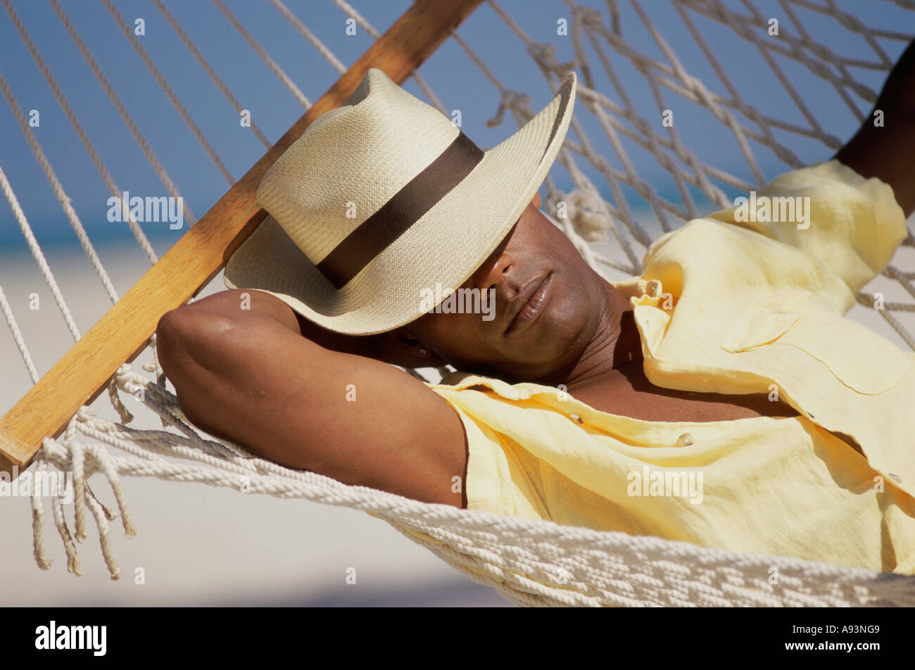 Man lying beach sleep hi-res stock photography and images - Page 3 - Alamy