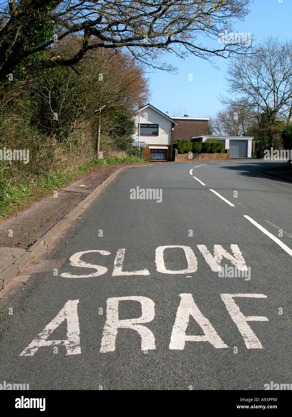 Slow Araf Bilingual Welsh English Language Road Markings On Bend On Road In Newport South Wales Uk Stock Photo Alamy