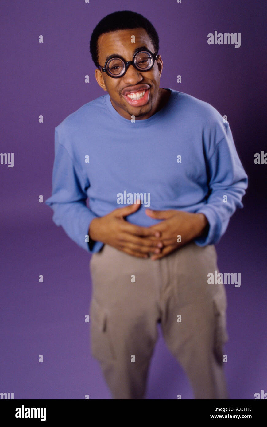 Smiling young black man hi-res stock photography and images - Alamy