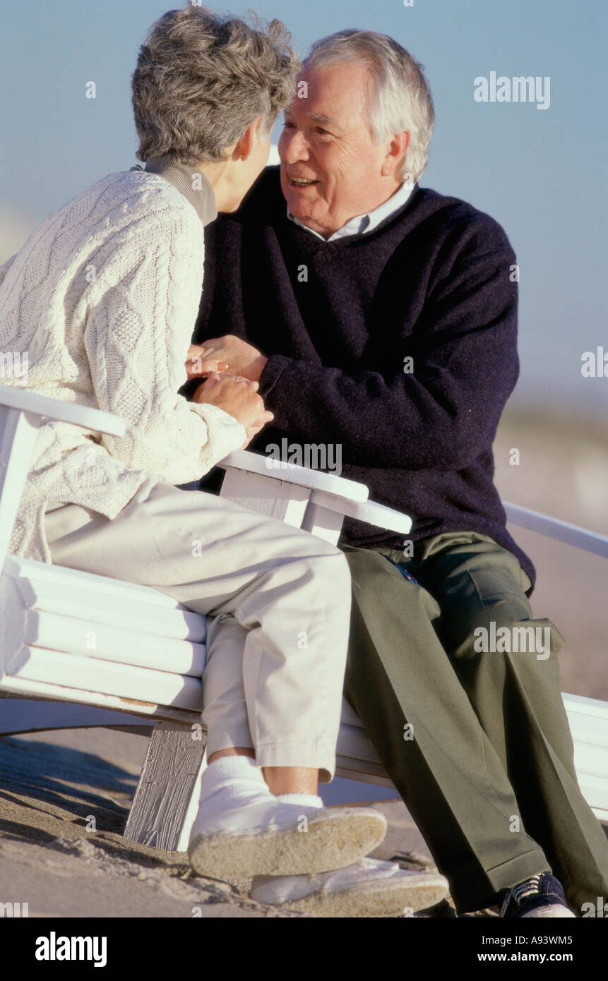 Senior couple sitting in chairs Stock Photo - Alamy