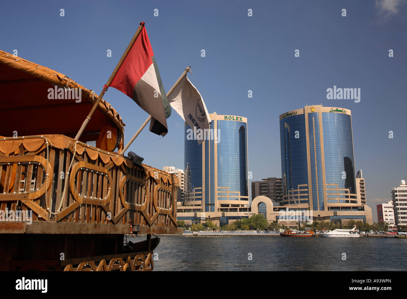 Old dhow and high rise buildings the Rolex Towers The Creek City Centre  Dubai United Arab Emirates Stock Photo - Alamy