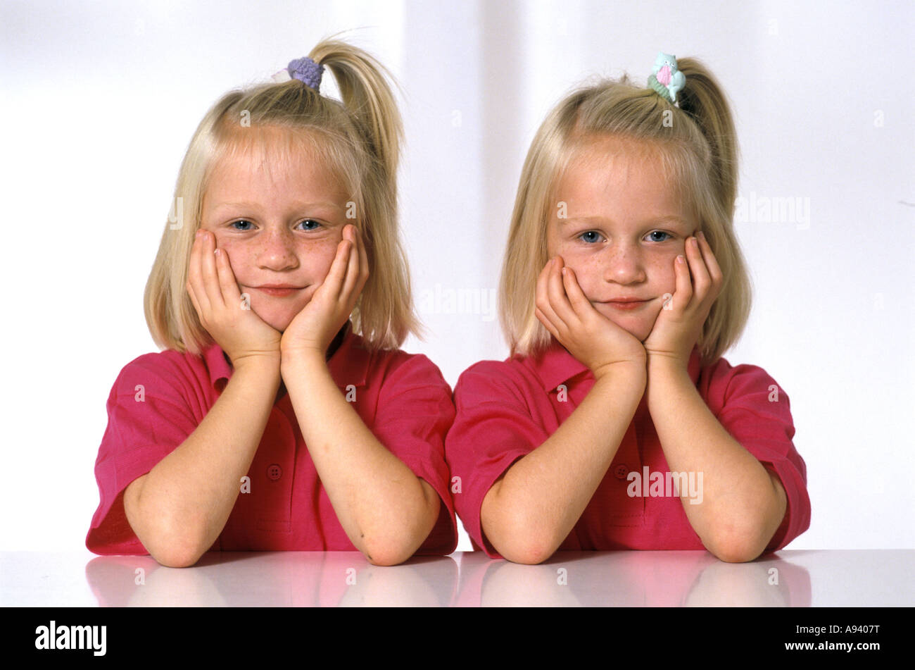 Twin children hi-res stock photography and images - Alamy