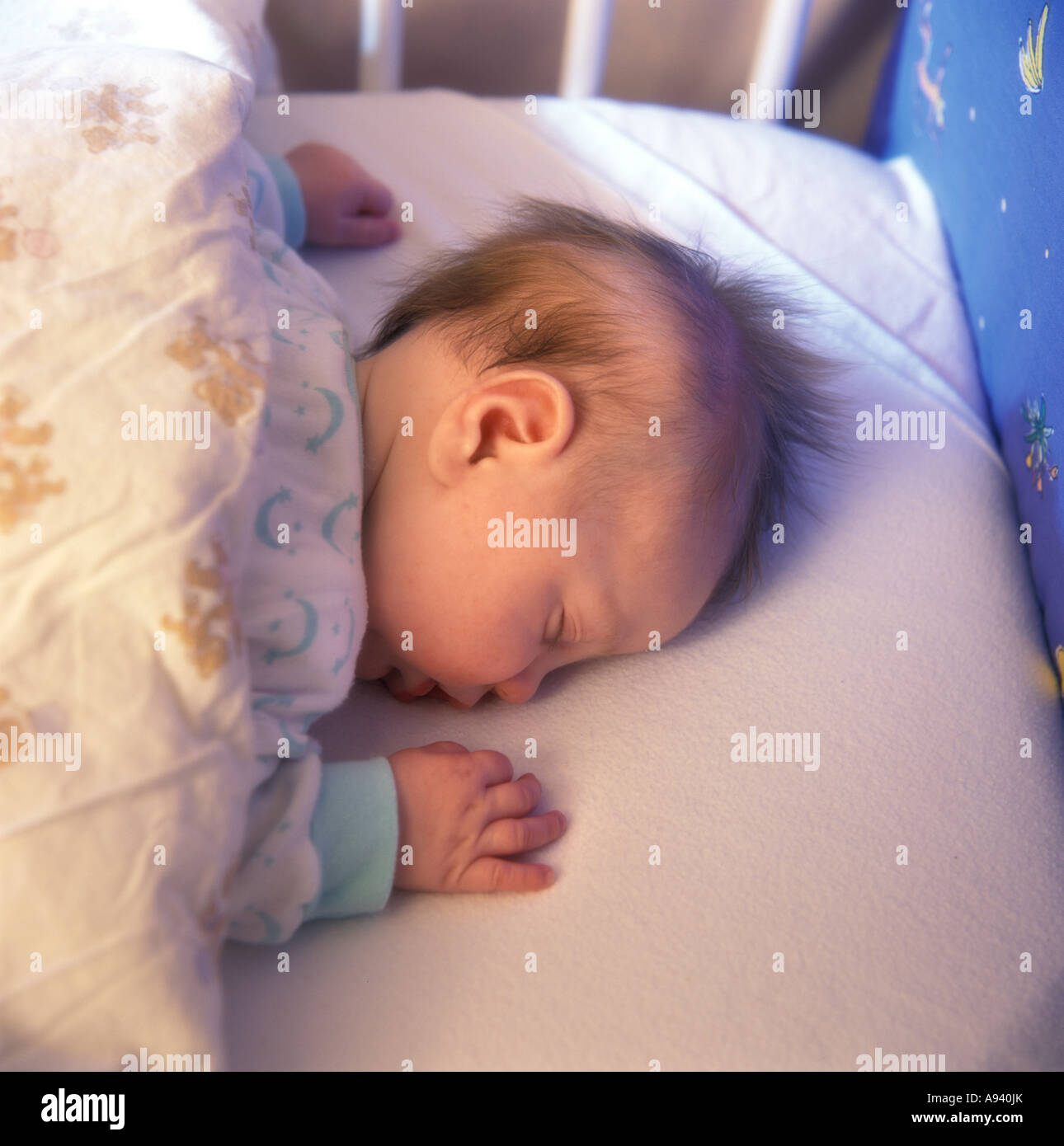Little baby is sleeping on his belly Stock Photo Alamy