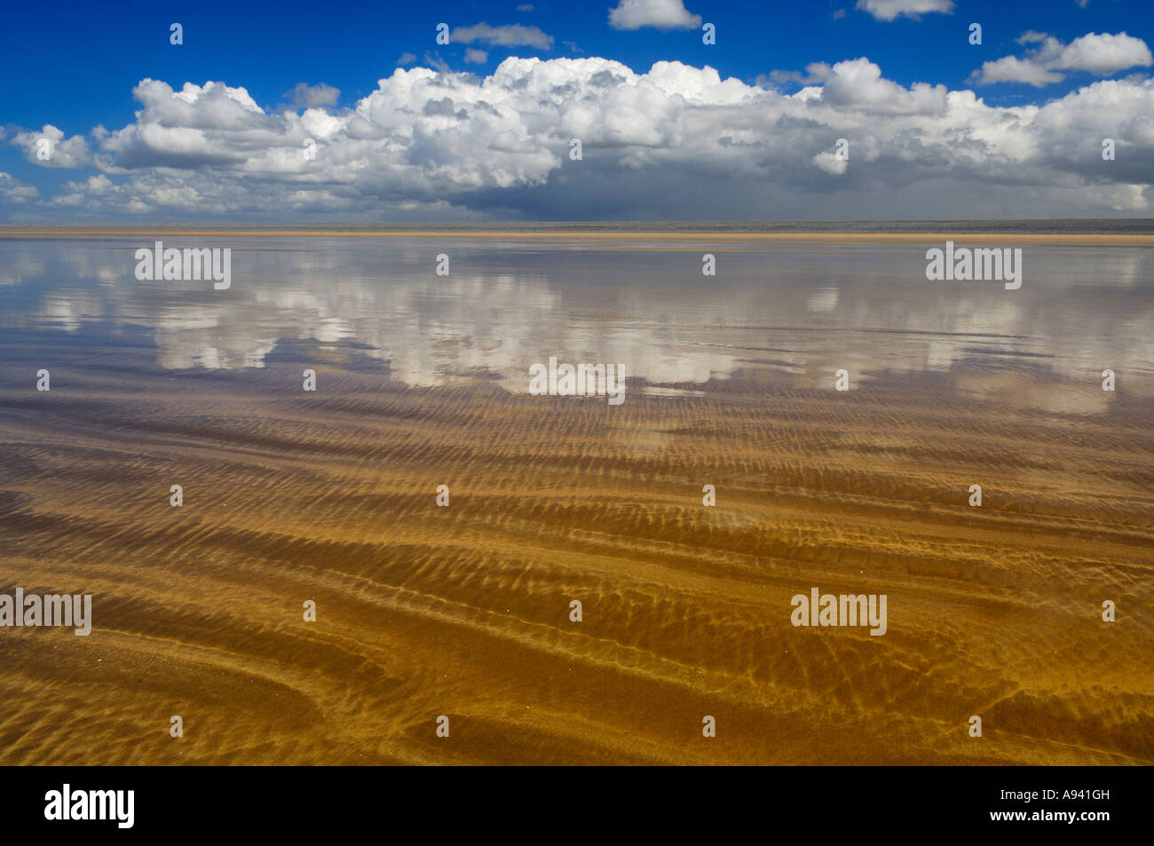 Cloudscape over the mile long sands of Westward Ho! beach in England. Stock Photo