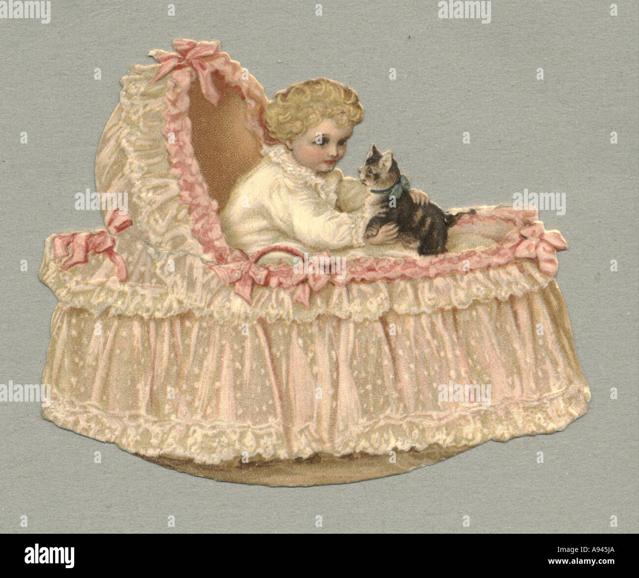 Chromolithographed and embossed die cut scrap of  baby in cot circa 1880 Stock Photo