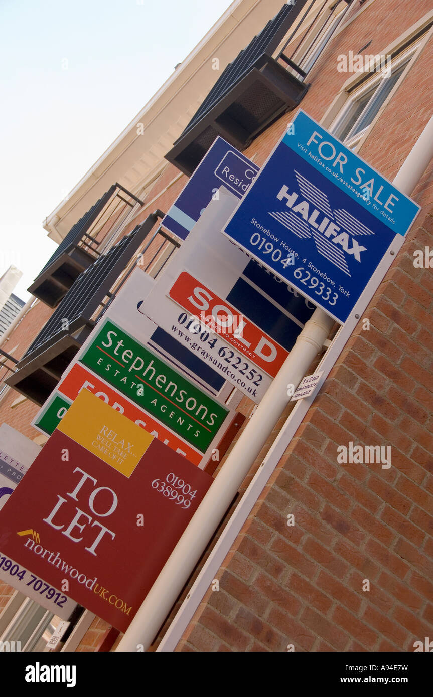 Residential property house flat for sale sign signs boards England UK