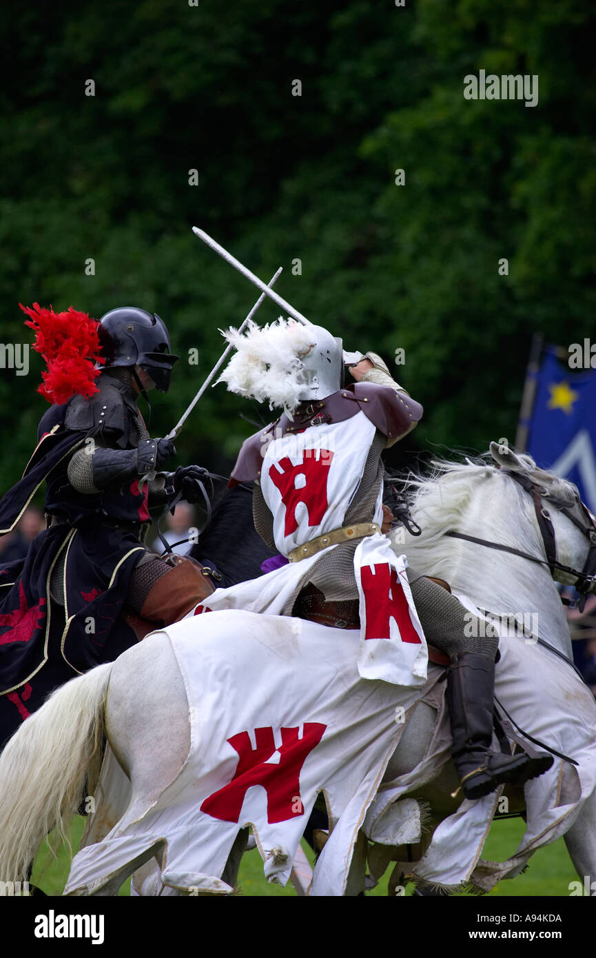 Knights jousting warwick castle England uk Stock Photo