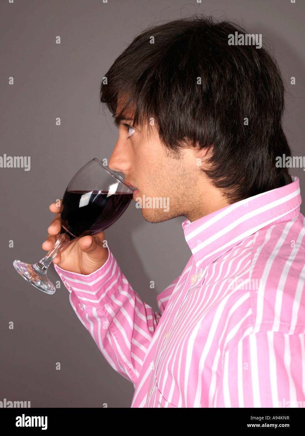Young Man Drinking Wine Model Released Stock Photo - Alamy