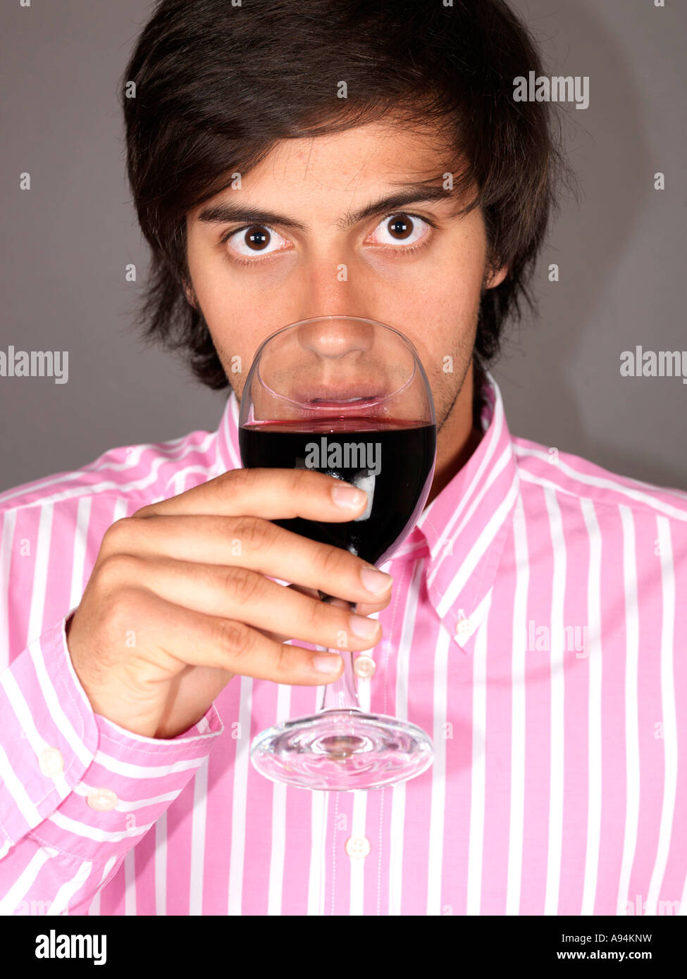 Young Man Drinking Wine Model Released Stock Photo - Alamy