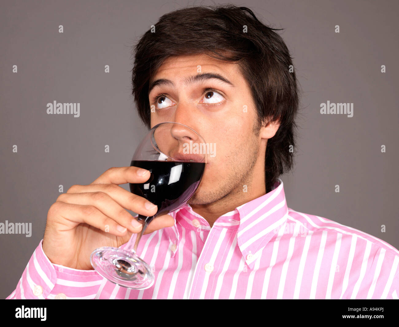 Young Man Drinking Wine Model Released Stock Photo - Alamy