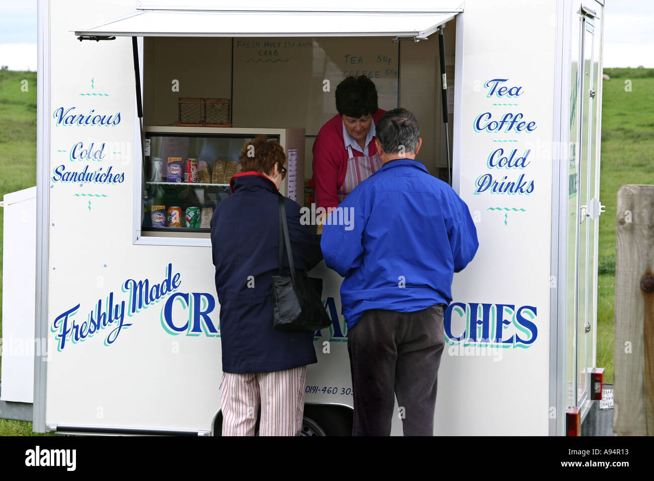 Mobile food and sandwich trailer selling fresh crab and seafood on Lindisfarne Stock Photo