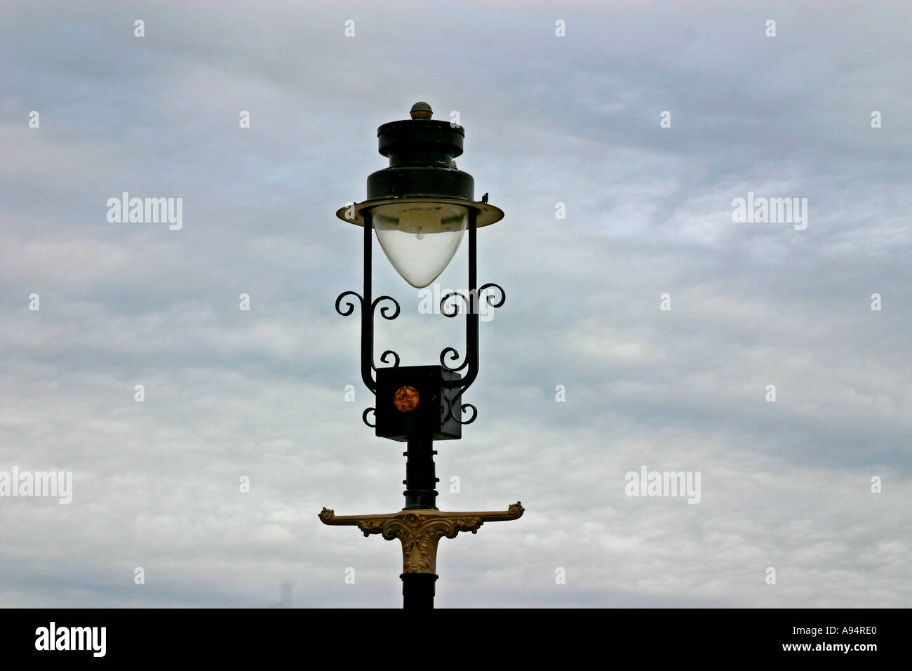 Street light standard to modern specification appearing as old unit Stock Photo