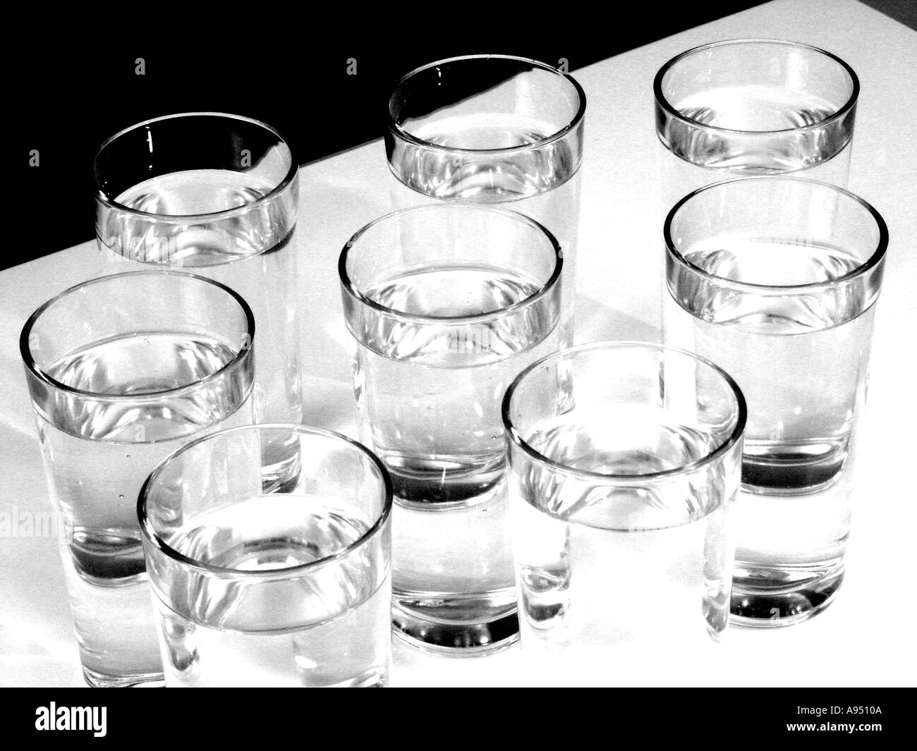 Eight glasses of water Stock Photo Alamy