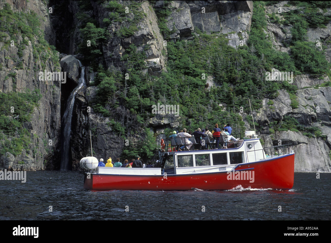 Tour boat in fijord at Gros Morne National Park Newfoundland Stock