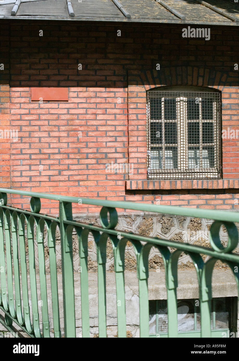 Brick building and railing Stock Photo - Alamy
