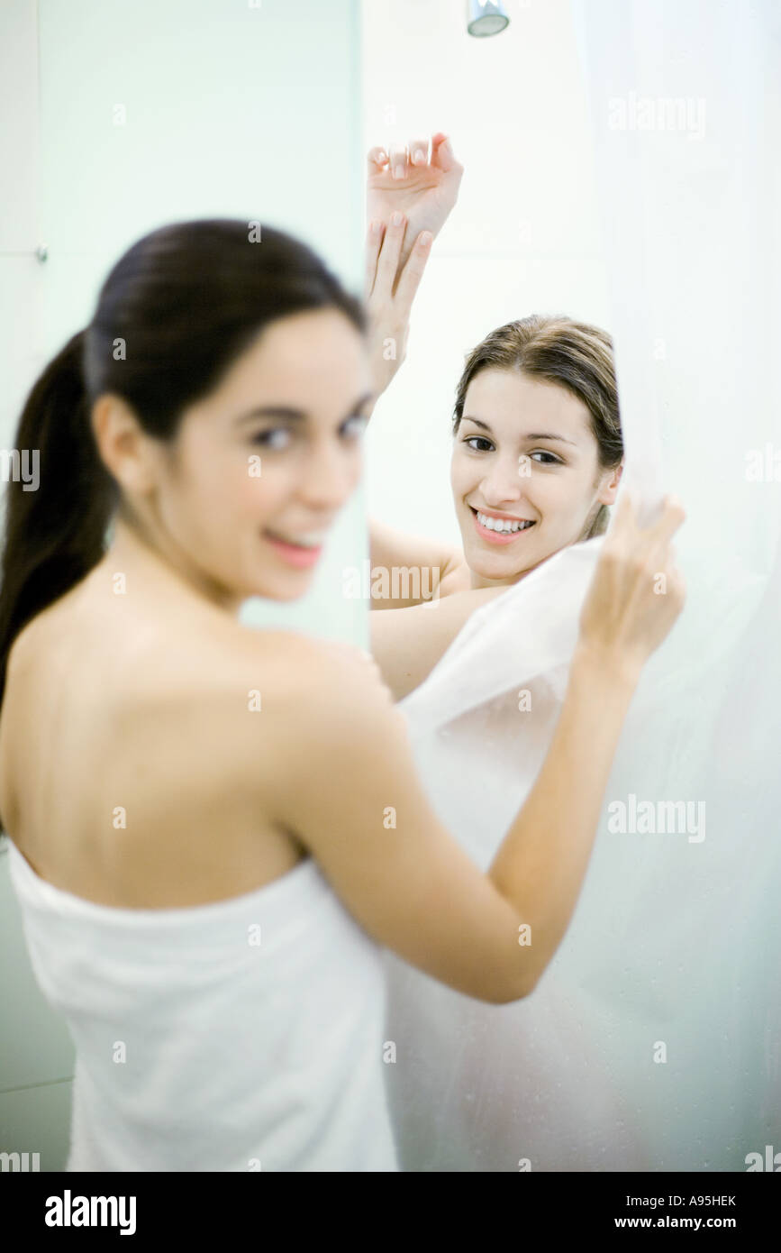 women taking showers together