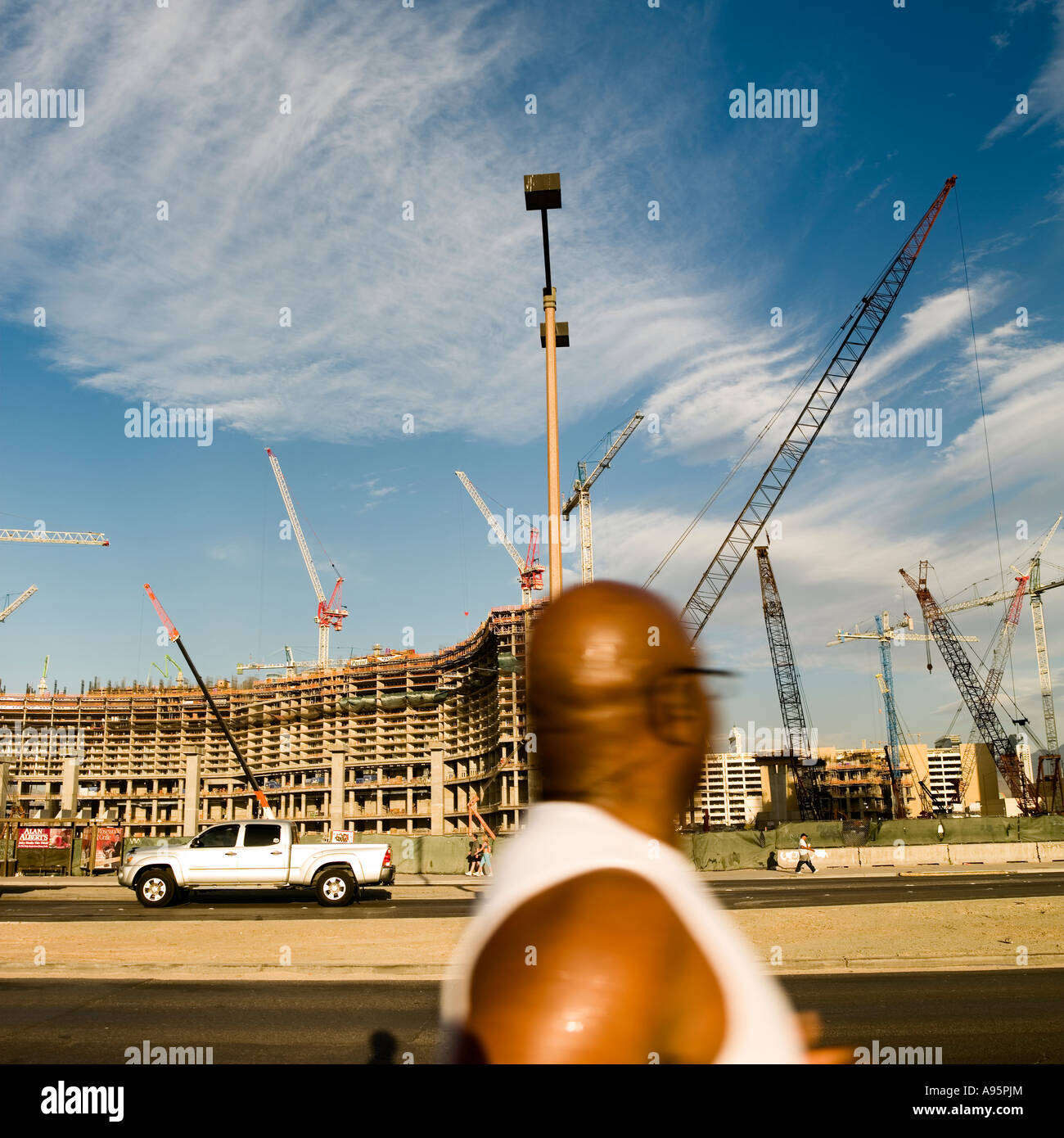CityCentre construction site Las Vegas Boulevard sidewalk No model release required non distinctive head turned away from shot Stock Photo
