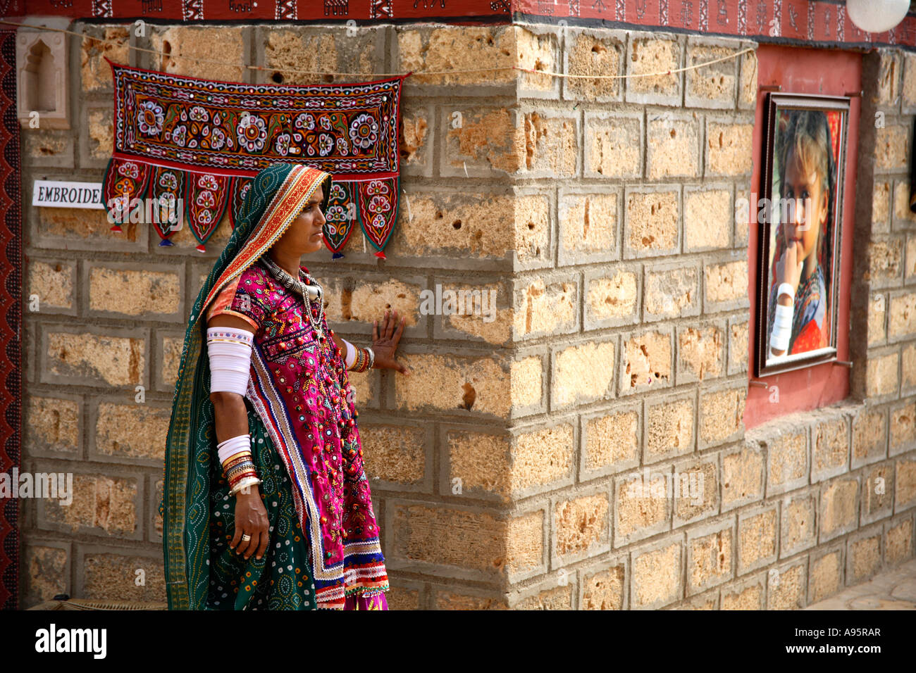 Harijan tribal female outside hut at Hiralaxmi Memorial Craft Park, Bhujodi Village, Kutch, Gujarat, India Stock Photo