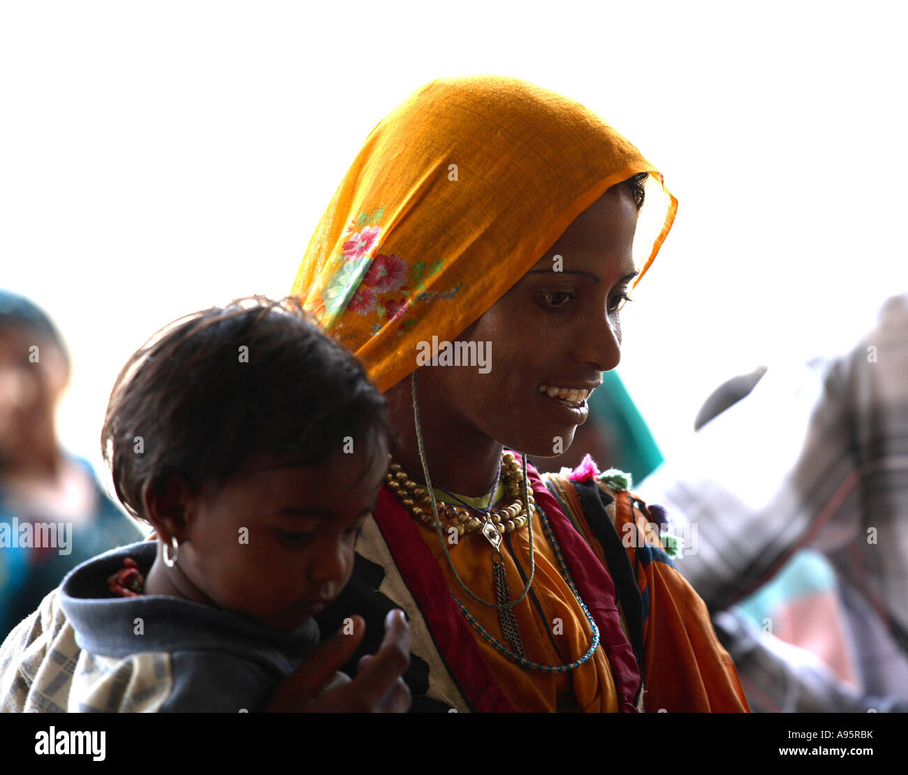 Mother & Child at Bhuj bus stand, Kutch, Gujarat, India Stock Photo