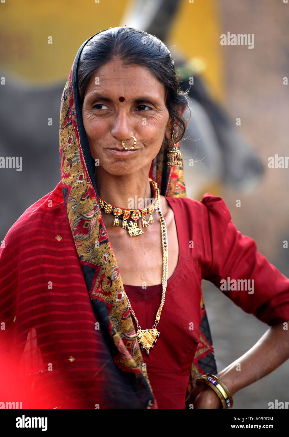 Tribal Indian woman from Kutch district at bus-stand, Bhuj, Gujarat, India Stock Photo