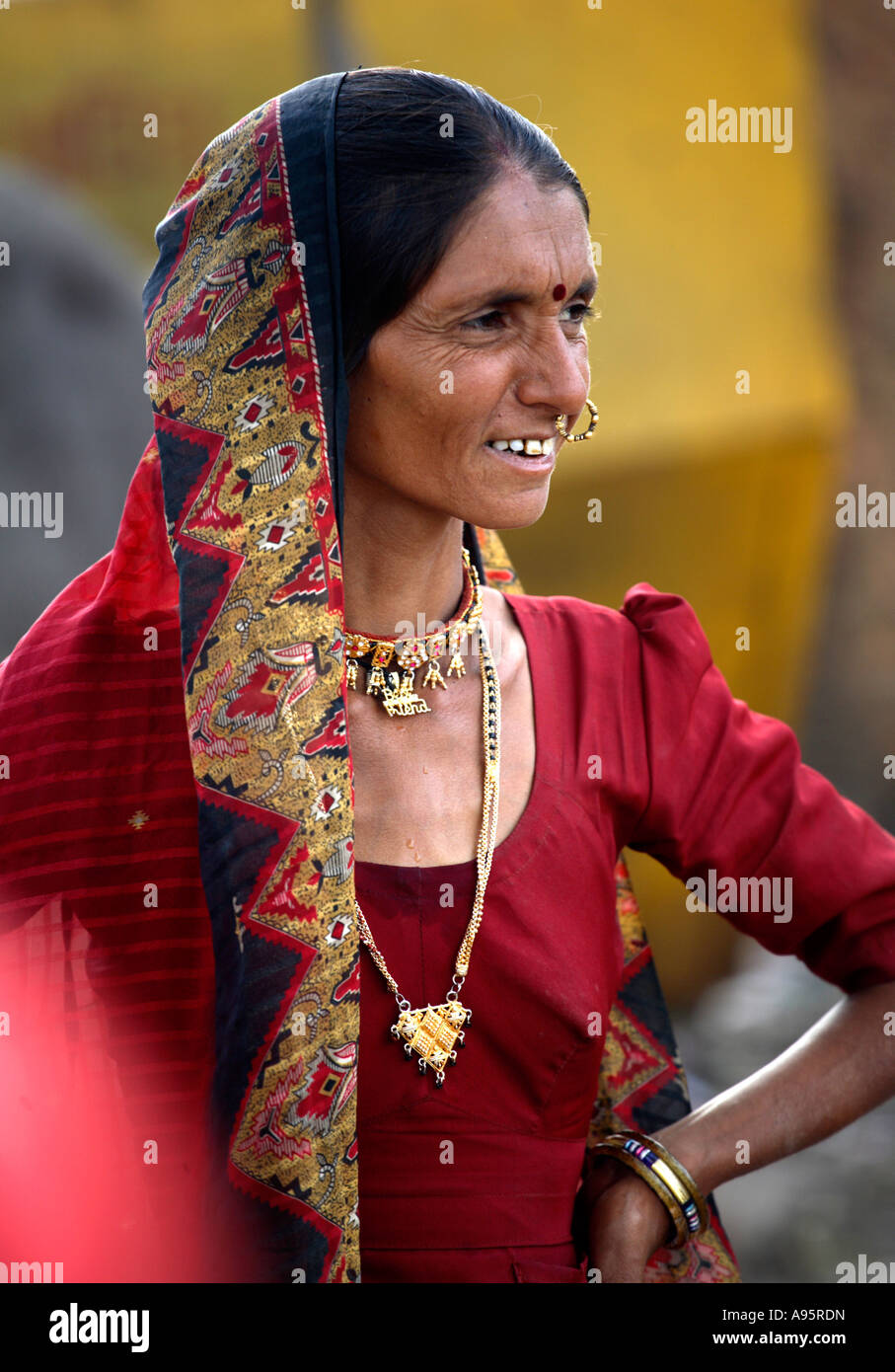 Tribal Indian woman from Kutch district at bus-stand, Bhuj, Gujarat, India Stock Photo
