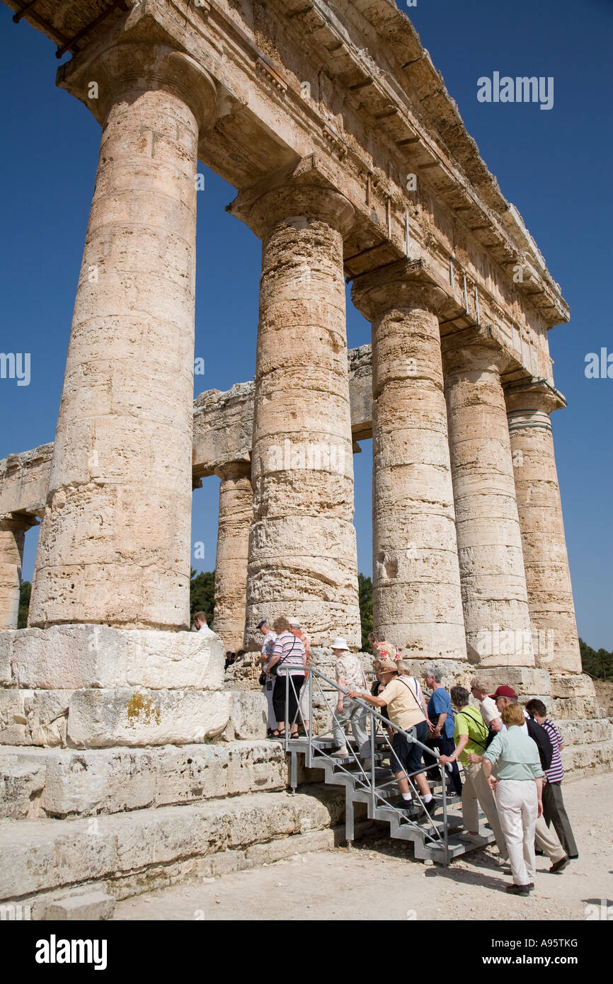 Tourists visit the 5th Century BC Greek Temple Segesta Sicily Italy Stock Photo