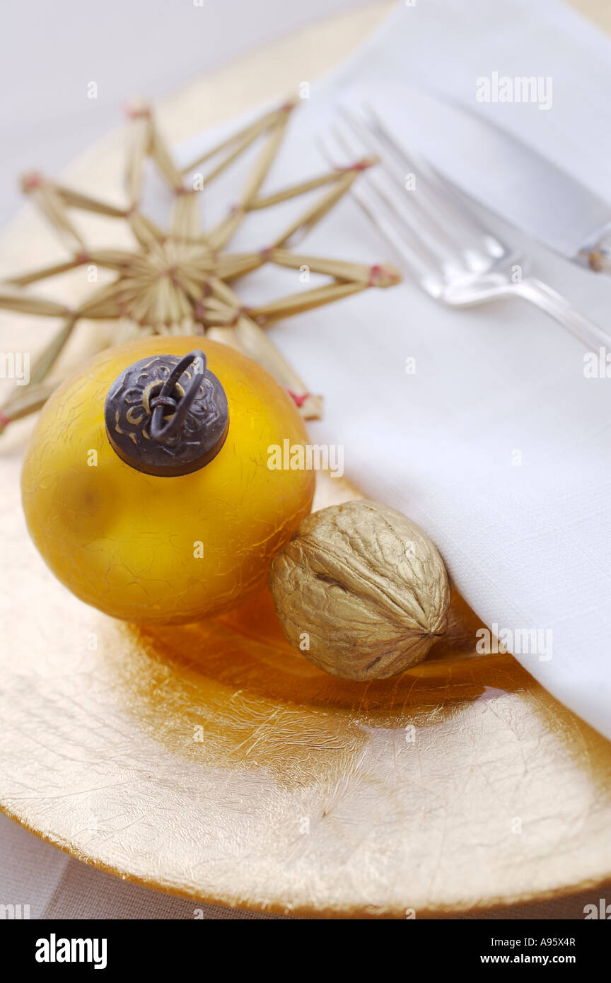 Table setting with golden Christmas decoration Stock Photo