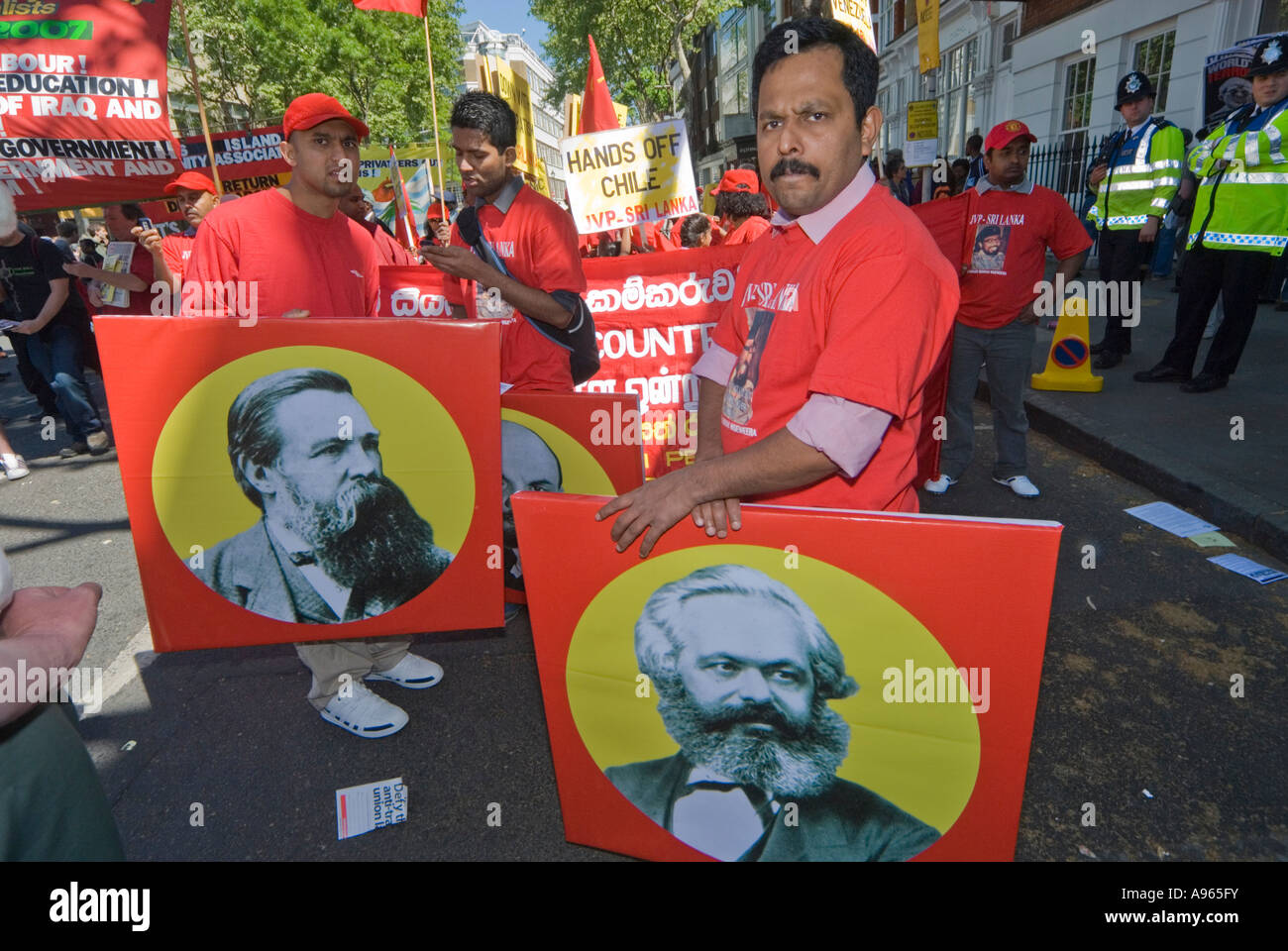 jvp-sri-lanka-marchers-with-portraits-of-the-great-communist-thinkers-A965FY.jpg