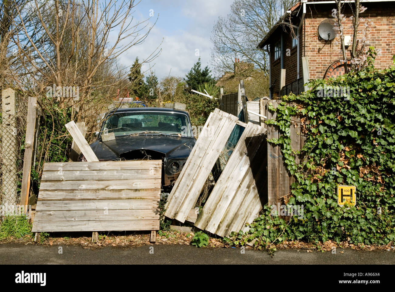 Abandoned Rolls Royce suburban urban landscape. South London. England  HOMER SYKES Stock Photo