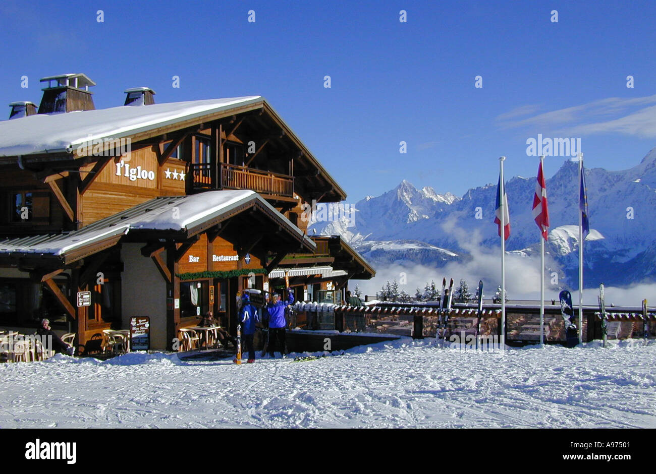 Restaurant on the ski slopes at Megeve France with Mont Blanc range of mountains in the background Stock Photo