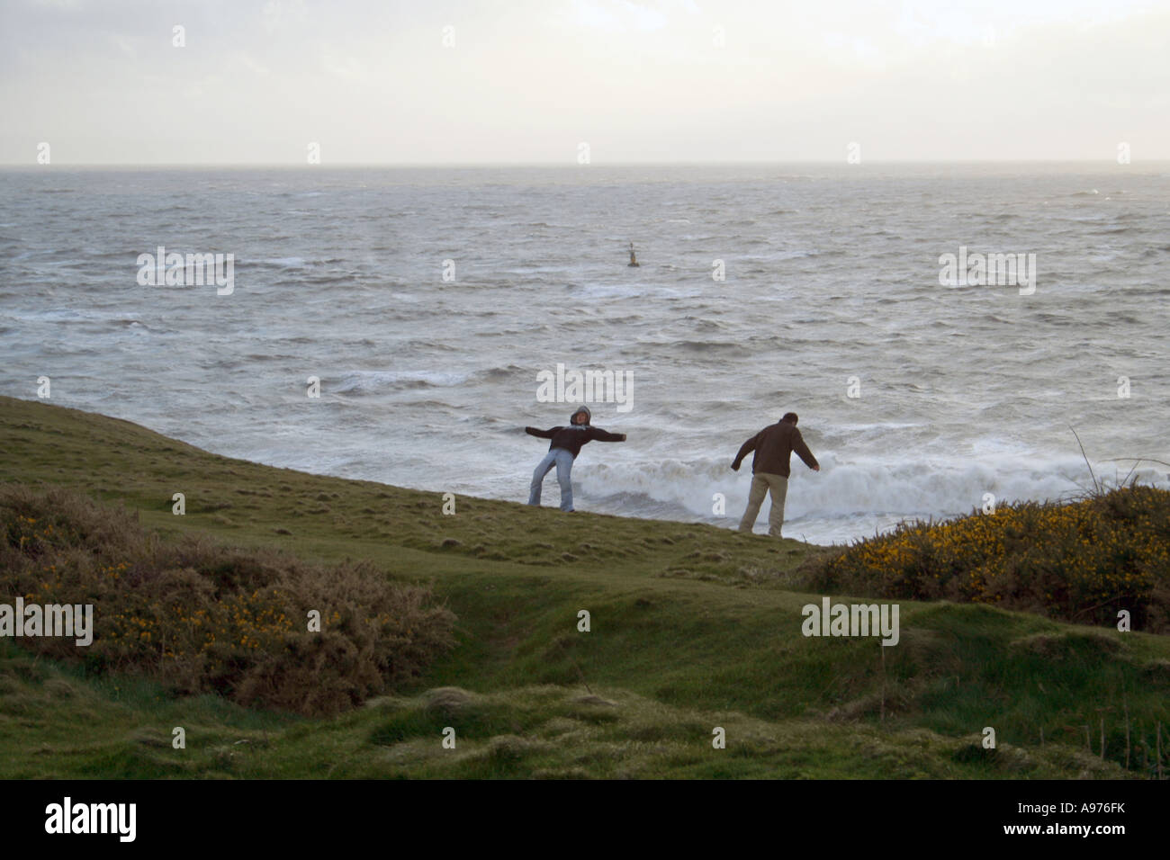 Leaning against Wind Nash Point Stock Photo Alamy