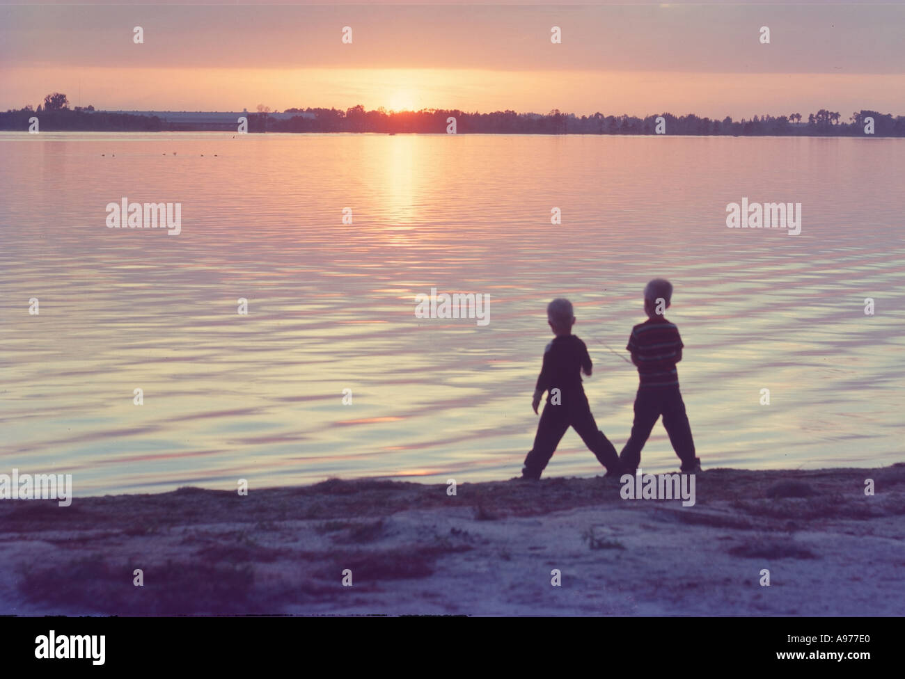 Two boys fishing hi-res stock photography and images - Alamy