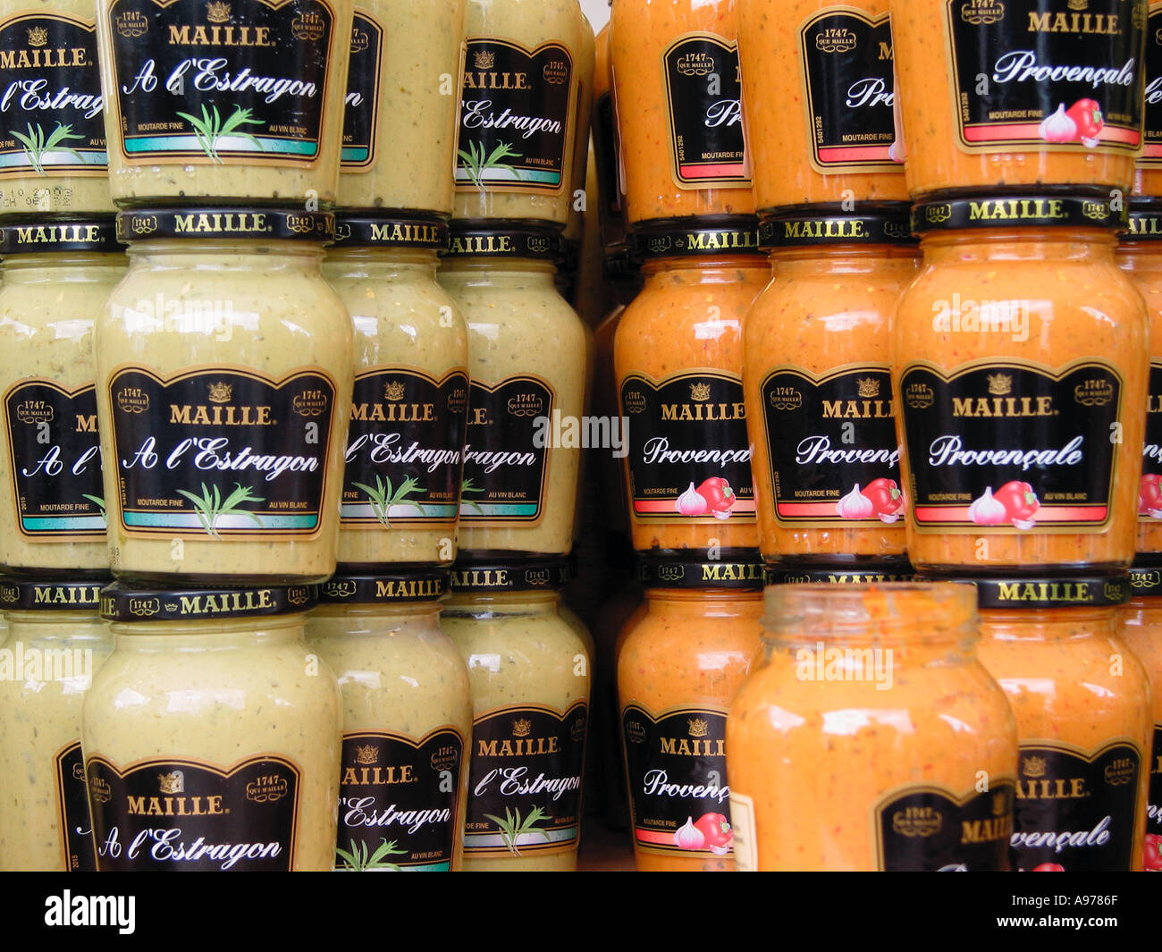 French Dijon mustard 'Maille' on display at a French market stall